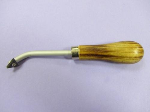 TRIANGULAR SCRAPER
